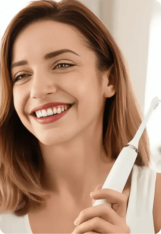 person using WellaWhite Electric Toothbrush